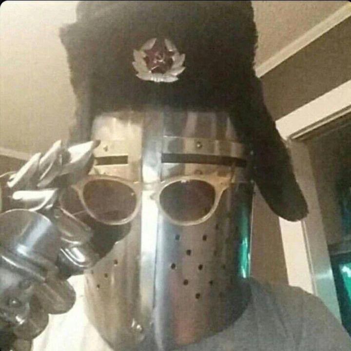 Meme: knight helmet with sunglasses and ushanka